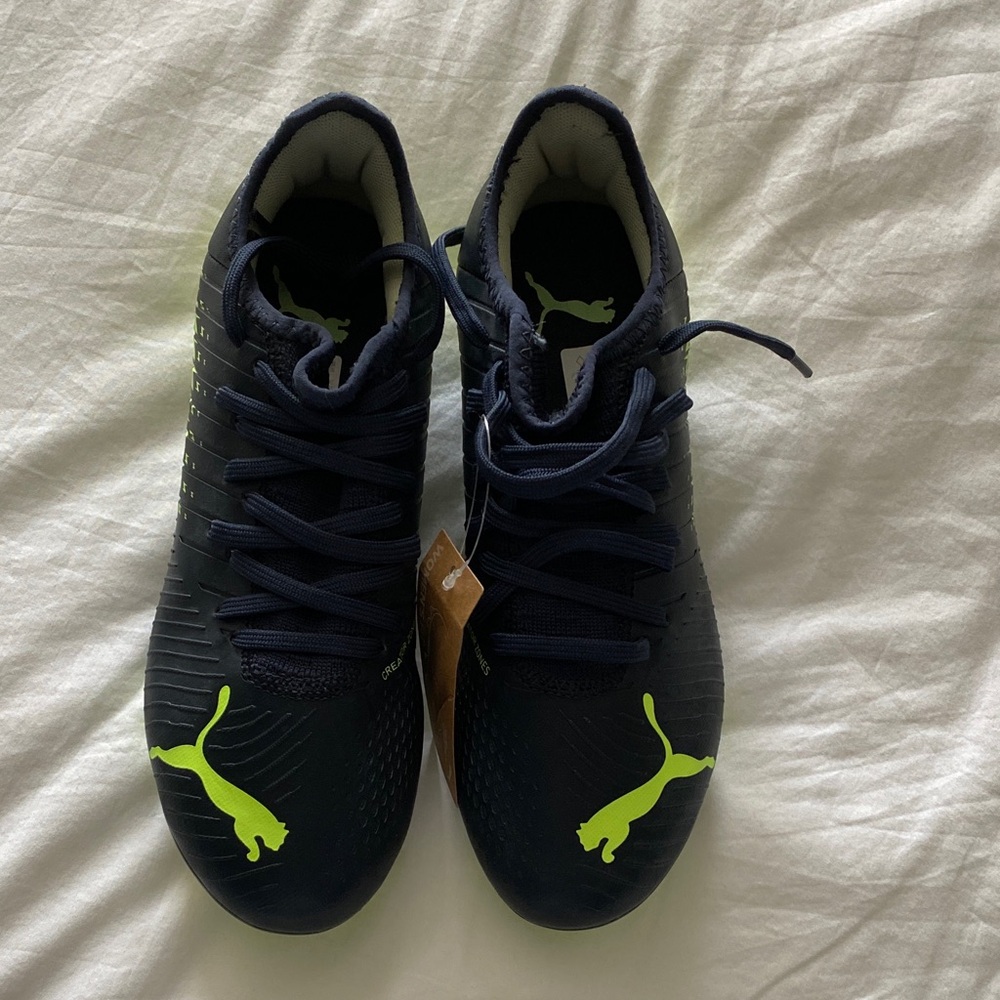 Puma ladies Black and Neon Green Soccer Shoes